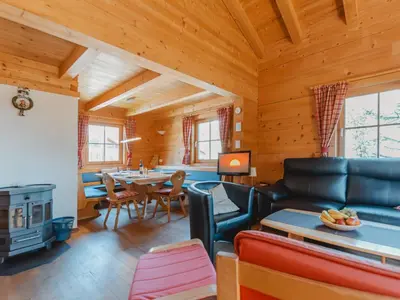 Ein Sitzbereich in der Unterkunft Chalet Königsleiten 1 by Interhome