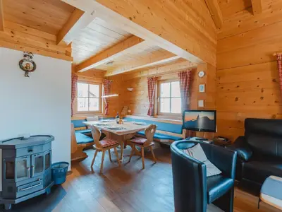 Ein Sitzbereich in der Unterkunft Chalet Königsleiten 1 by Interhome