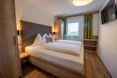 Ein Bett oder Betten in einem Zimmer der Unterkunft AppartMO 243 Top 2