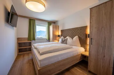 Ein Bett oder Betten in einem Zimmer der Unterkunft AppartMO 243 Top 2