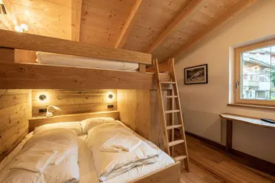 Ein Bett oder Betten in einem Zimmer der Unterkunft Filzsteinresort Chalets Chalet Bergankunft 236