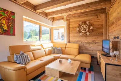 Ein Sitzbereich in der Unterkunft Filzsteinresort Chalets - Chalet 238