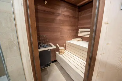 Ein Bett oder Betten in einem Zimmer der Unterkunft Filzsteinresort Chalets - Chalet 239