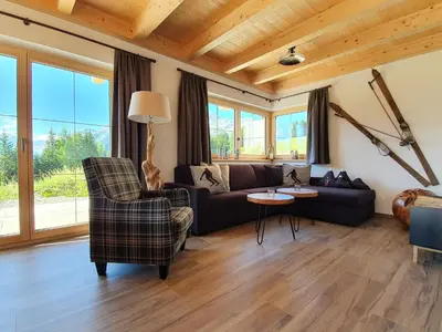 Ein Sitzbereich in der Unterkunft Filzsteinresort Chalets - Chalet 240