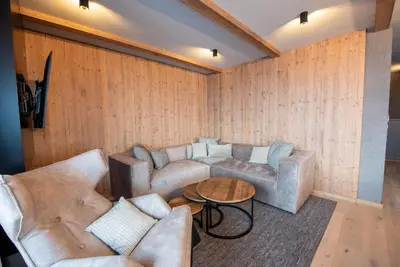 Ein Sitzbereich in der Unterkunft Filzsteinresort Wohnungen Top 3