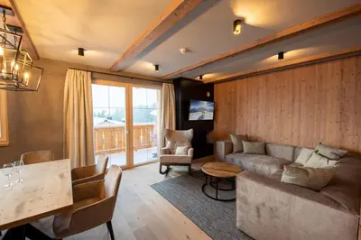 Ein Sitzbereich in der Unterkunft Filzsteinresort Wohnungen Top 10