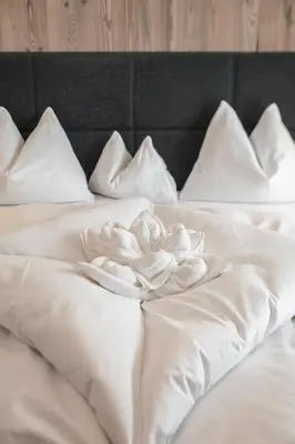 Ein Bett oder Betten in einem Zimmer der Unterkunft Kaiserjuwel 4 Sterne Superior