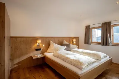 Ein Bett oder Betten in einem Zimmer der Unterkunft Haus Boarbauer