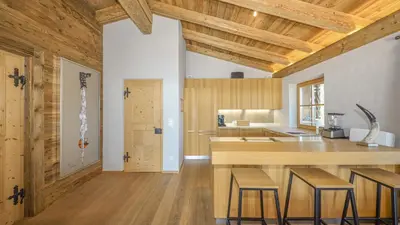 Küche/Küchenzeile in der Unterkunft Chalet Bockberg - Ski in & out, Jacuzzi Sauna, Bergblick - by One Villas