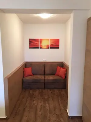 Ein Sitzbereich in der Unterkunft Hotel Garni Ingeborg