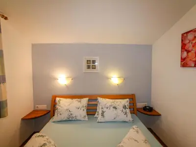 Ein Bett oder Betten in einem Zimmer der Unterkunft Holiday Home Margit by Interhome