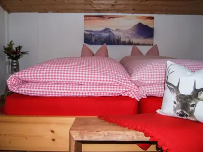 Ein Bett oder Betten in einem Zimmer der Unterkunft Holiday Home Geislerhütte by Interhome