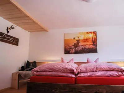 Ein Bett oder Betten in einem Zimmer der Unterkunft Holiday Home Geislerhütte by Interhome