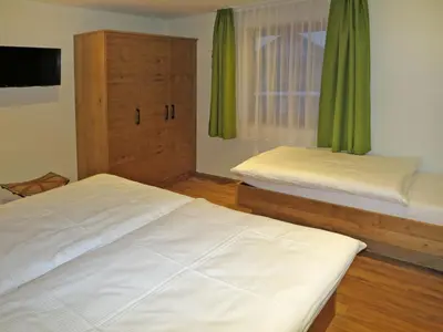 Ein Bett oder Betten in einem Zimmer der Unterkunft Apartment Apart Bergart by Interhome