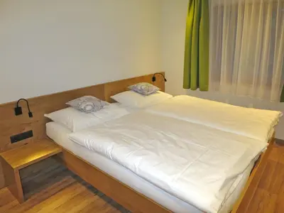 Ein Bett oder Betten in einem Zimmer der Unterkunft Apartment Apart Bergart by Interhome