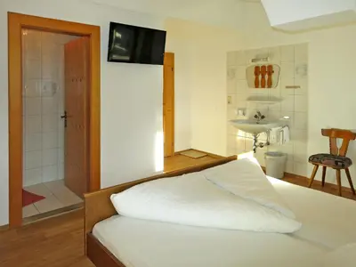 Ein Bett oder Betten in einem Zimmer der Unterkunft Apartment Heisenhaus-3 by Interhome
