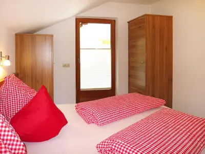 Ein Bett oder Betten in einem Zimmer der Unterkunft Apartment Neuner-2 by Interhome