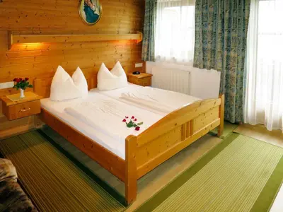 Ein Bett oder Betten in einem Zimmer der Unterkunft Apartment Landhaus Heim by Interhome