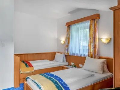 Ein Bett oder Betten in einem Zimmer der Unterkunft Apartment Markus by Interhome