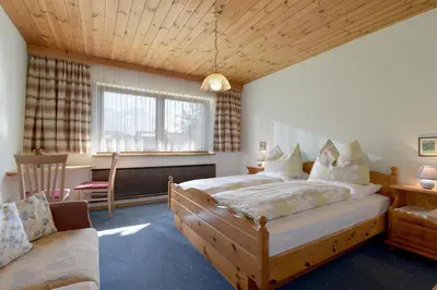 Ein Bett oder Betten in einem Zimmer der Unterkunft Haus Müller Eleonore