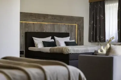 Ein Bett oder Betten in einem Zimmer der Unterkunft Hotel ZUM STERNENHOF