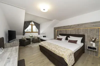 Ein Bett oder Betten in einem Zimmer der Unterkunft Hotel ZUM STERNENHOF