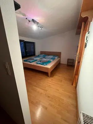 Ein Bett oder Betten in einem Zimmer der Unterkunft Bichlhaus Appartements