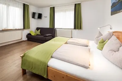 Ein Bett oder Betten in einem Zimmer der Unterkunft Apartment Hohe Tauern