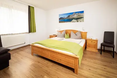 Ein Bett oder Betten in einem Zimmer der Unterkunft Apartment Hohe Tauern