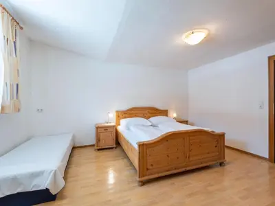 Ein Bett oder Betten in einem Zimmer der Unterkunft Apartment in Tyrol near Ski Lift