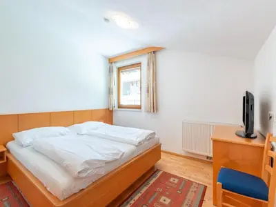 Ein Bett oder Betten in einem Zimmer der Unterkunft Apartment in Tyrol near Ski Lift