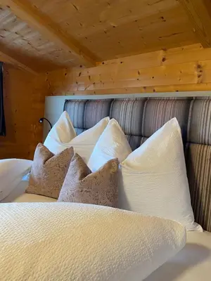 Ein Bett oder Betten in einem Zimmer der Unterkunft LH Apartment