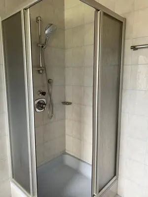 Ein Badezimmer in der Unterkunft LH Apartment
