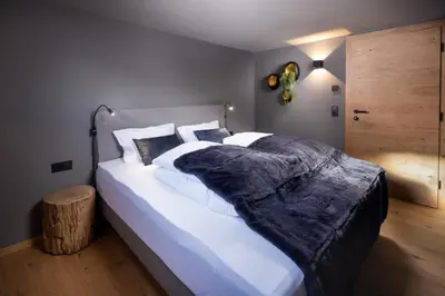 Ein Bett oder Betten in einem Zimmer der Unterkunft Schöneben Appartementen Top 1