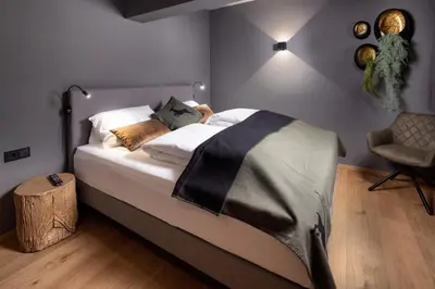 Ein Bett oder Betten in einem Zimmer der Unterkunft Schöneben Appartementen Top 4