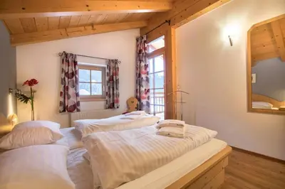 Ein Bett oder Betten in einem Zimmer der Unterkunft Schöneben Chalet Waldblick