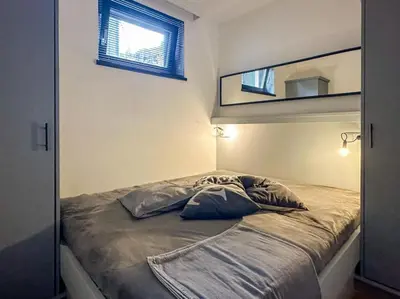 Ein Bett oder Betten in einem Zimmer der Unterkunft Schöneben Chalet Schneerose