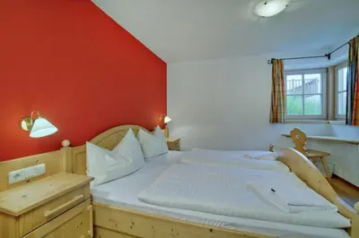 Ein Bett oder Betten in einem Zimmer der Unterkunft Schöneben Chalet 4-Jahreszeiten
