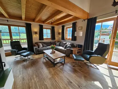 Ein Sitzbereich in der Unterkunft Schöneben Chalet Vienna
