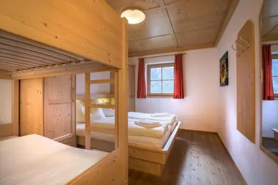 Ein Bett oder Betten in einem Zimmer der Unterkunft Schöneben Chalet Hohe Schwalbe