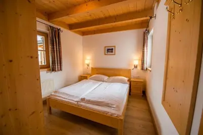 Ein Bett oder Betten in einem Zimmer der Unterkunft Schöneben Chalet Drei Sonnen