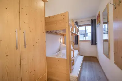 Ein Bett oder Betten in einem Zimmer der Unterkunft Schöneben Chalet Anne Marie