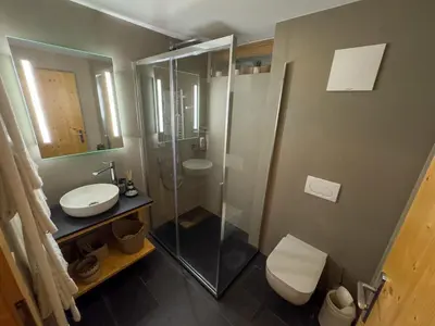 Ein Badezimmer in der Unterkunft Schöneben Achental Hütte