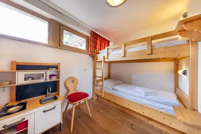Ein Bett oder Betten in einem Zimmer der Unterkunft Schöneben Chalet Scorleduyn