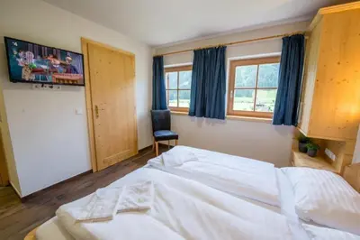 Ein Bett oder Betten in einem Zimmer der Unterkunft Schöneben Chalet MiJoBa