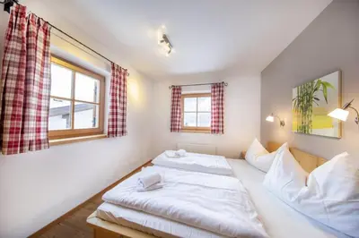 Ein Bett oder Betten in einem Zimmer der Unterkunft Schöneben Chalet MilKa