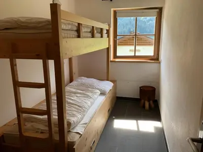 Ein Bett oder Betten in einem Zimmer der Unterkunft Schöneben Traumhütte
