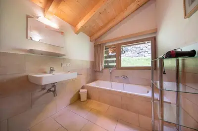Ein Badezimmer in der Unterkunft Schöneben Haus Arnika