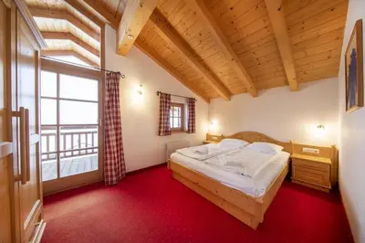 Ein Bett oder Betten in einem Zimmer der Unterkunft Schöneben Chalet Sonnenwende