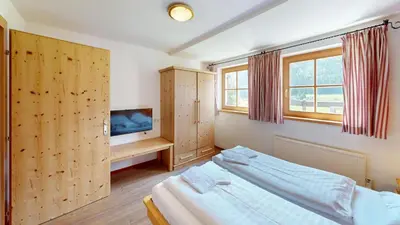 Ein Bett oder Betten in einem Zimmer der Unterkunft Schöneben Chalet Escape